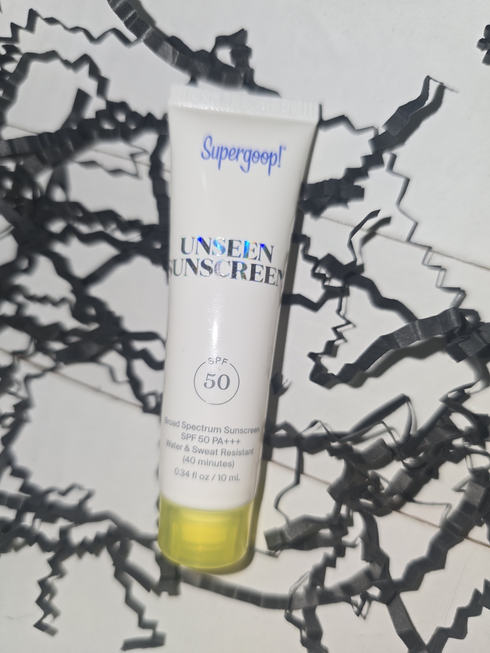 Supergoop! White Tube Sunscreen with Yellow Cap — Unseen SPF 50